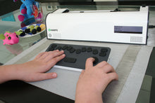 Load image into Gallery viewer, Mountbatten Tutor printer and separate keyboard with child&#39;s hand
